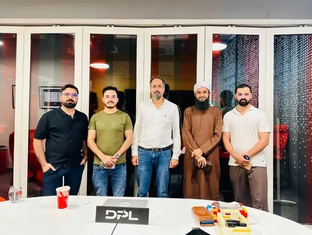 Owais Attari with the DPL team in their office